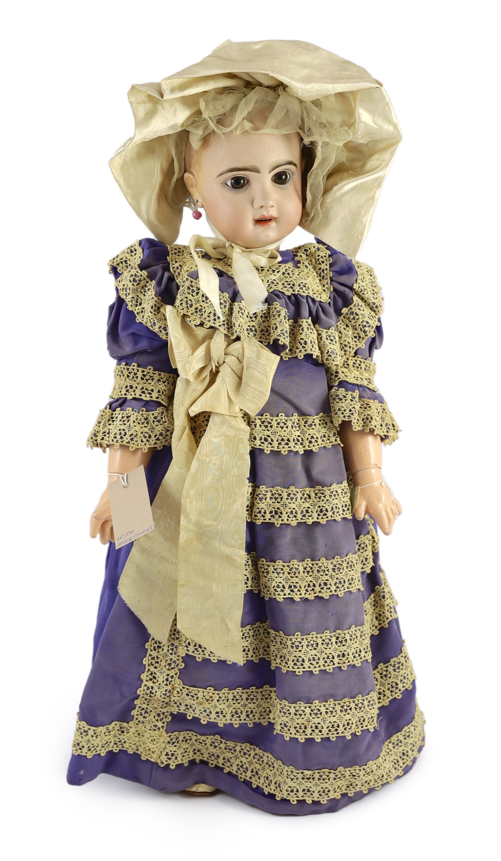 A Jumeau moulded bisque phonograph doll, French, circa 1889, 24in.